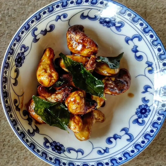 ROASTED CASHEWS IN TAMARI REDUCTION w/ CRISPY CURRY LEAVES